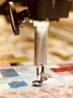 Fat Stitch Pro Edge-to-Edge Longarm Quilting Services